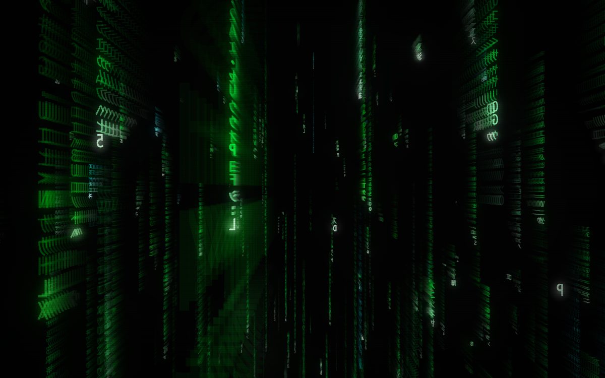 Green glyphs falling down the walls of a corridor that recedes into darkness.